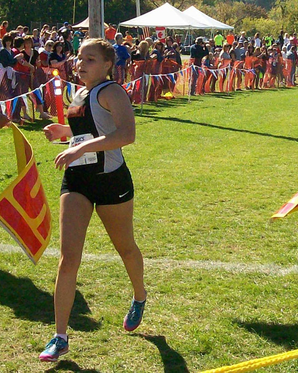 Image of the Utica Police and Fire Fighters Memorial Girls JV race winner Abbi Wright from Bethlehem