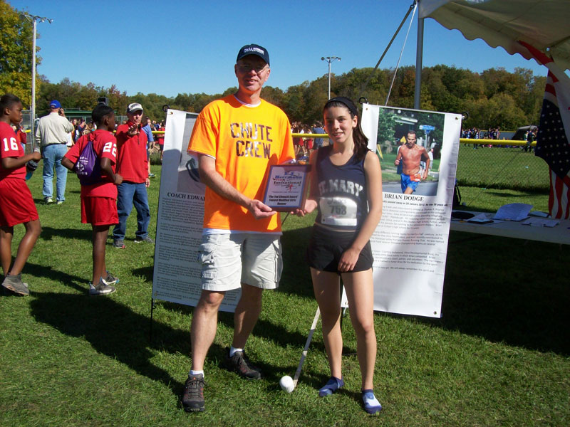 Image of the Ted Chwazik Award award winner Brittany Alkerton from St Mary's (CAN), presented by Mr. Gerard Chwazik, favorite brother of Mr. Ted Chwazik