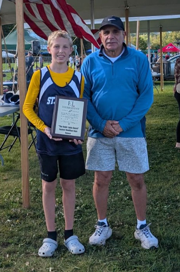 Image of the Ralph Lupia Award award winner Ethan Ferguson from St. Mary - Brockville, presented by Mr. Ralph Lupia